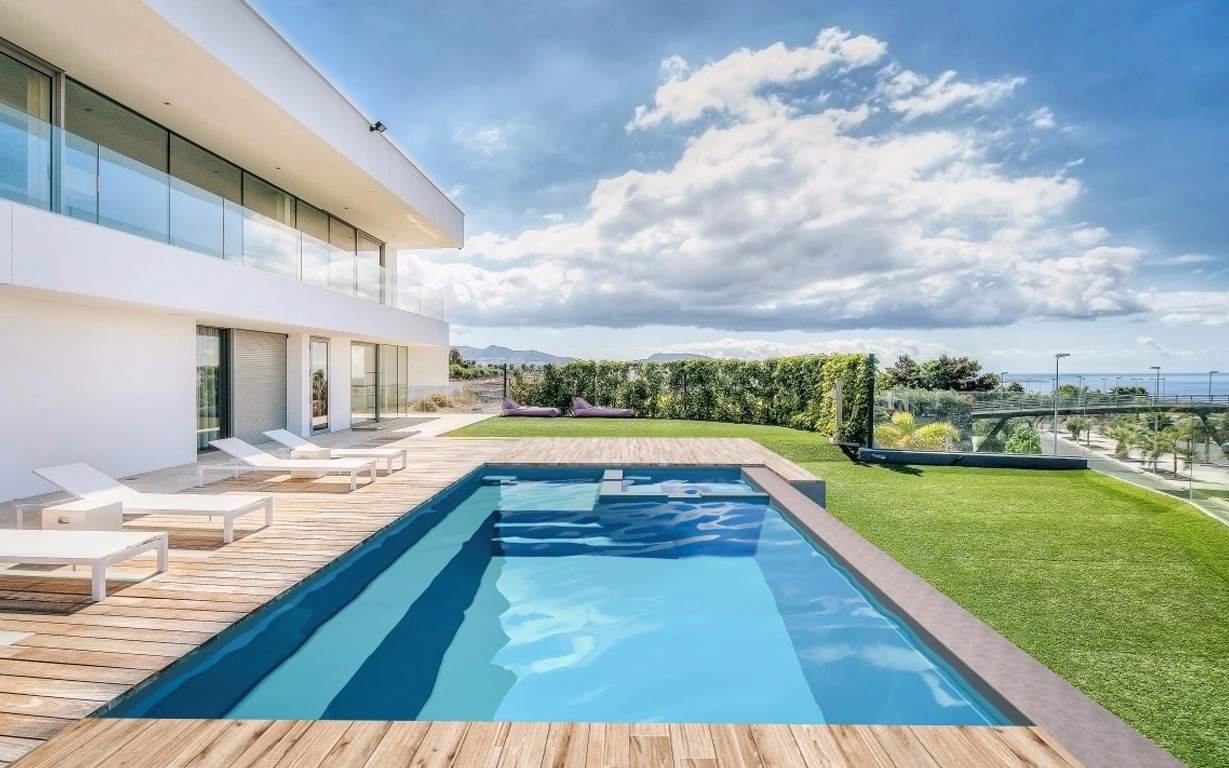 Modern luxury pool with wooden deck